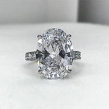 3Ct Oval Cut Diamond Solitaire Engagement Ring 14K White Gold Over Round Accents