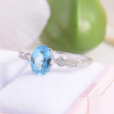 1.6ct Oval Cut Blue Topaz Engagement Ring Diamond Accents 14k White Gold Finish