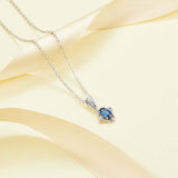 0.6ct Oval Cut Blue Sapphire Diamond Style Pendant with Chain 14k WhiteGold Over