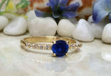 1.2ct Round Cut Blue Sapphire Solitaire with Accent Ring 14k Yellow Gold Finish