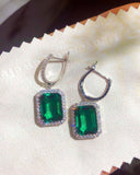 1.5ct Green Emerald Cut Simulated Halo Dangle Earrings 14k White Gold Plated