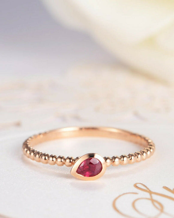 0.5ct Pear Cut Pink Ruby Bezel Set Beaded Ball Solitaire Ring 14k Rose Gold Over