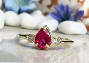 1.3ct Engagement Ring Pear Cut Pink Ruby Three Stone 14k Yellow Gold Finish