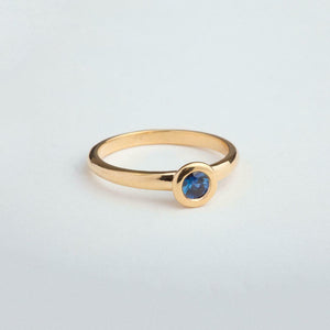 0.5ct Round Cut Blue Sapphire Bezel Set Solitaire Ring 14k Yellow Gold Finish