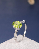 1.5ct Oval Cut Green Peridot Engagement Ring Diamond Accents 14k White Gold Over