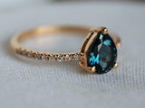 1.2ct Pear Cut London Blue Topaz Solitaire with Accent Ring 14k Rose Gold Finish