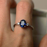 1ct Oval Blue Sapphire Engagement Ring Round Accents Trilogy 14k White Gold Over