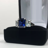 2.5ct Emerald Cut Blue Sapphire Trilogy Engagement Ring 14k White Gold Finish