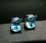 2.3ct Stud Earrings Oval Cut Blue Topaz Solitaire Design 14k Rose Gold Finish