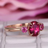 1.8ct Oval Cut Pink Ruby Engagement Ring Round Accent Trilogy 14k Rose Gold Over