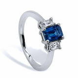 1.7ct Emerald Cut Blue Sapphire Engagement Ring Trilogy 18k White Gold Finish