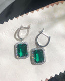 1.5ct Green Emerald Cut Simulated Halo Dangle Earrings 14k White Gold Plated