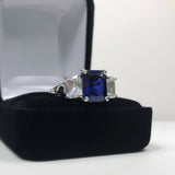 2.5ct Emerald Cut Blue Sapphire Trilogy Engagement Ring 14k White Gold Finish