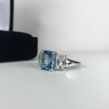 2.5ct Emerald Cut Blue Tanzanite Trilogy Engagement Ring 14k White Gold Finish