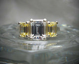 2.5ct Emerald Cut Diamond Trilogy Ring 14k WhiteGold Over Yellow Sapphire Accent