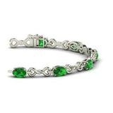 10ct Oval Cut Green Emerald Infinity Knot Tennis Bracelet 14k White Gold Over