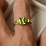 2ct Emerald Cut Green Peridot Pear Accents Trilogy Ring 14k White Gold Finish