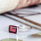 1.5ct Emerald Cut Red Garnet Accents with Solitaire Ring 14k White Gold Finish