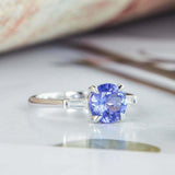 1.2ct Round Cut Blue Sapphire Baguette Accent Trilogy Ring 14k White Gold Finish