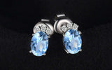 2.3ct Stud Earrings Oval Cut Blue Topaz Crown Design 14k White Gold Finish