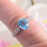 1.6ct Oval Cut Blue Topaz Engagement Ring Diamond Accents 14k White Gold Finish