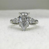 3Ct Pear Cut Diamond Three Stone Solitaire Engagement Ring 18K White Gold Finish