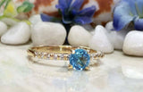 1.2ct Round Cut Blue Topaz Solitaire with Accent Ring 14k Yellow Gold Finish