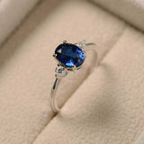 1ct Oval Blue Sapphire Engagement Ring Round Accents Trilogy 14k White Gold Over