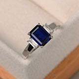 2ct Emerald Cut Blue Sapphire Baguette Accent Trilogy Ring 14k White Gold Finish