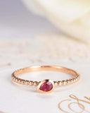 0.5ct Pear Cut Pink Ruby Bezel Set Beaded Ball Solitaire Ring 14k Rose Gold Over