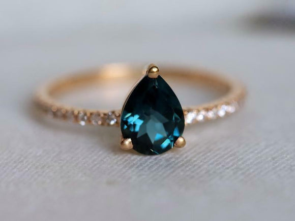 1.2ct Pear Cut London Blue Topaz Solitaire with Accent Ring 14k Rose Gold Finish