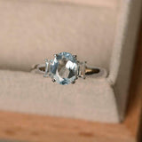 2ct Oval Cut Blue Aquamarine Baguette Accents Trilogy Ring 14k White Gold Finish