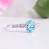 1.6ct Oval Cut Blue Topaz Engagement Ring Diamond Accents 14k White Gold Finish