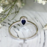 1Ct Pear Cut Sapphire Bezel Set Solitaire Engagement Ring 14K White Gold Finish