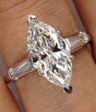 4Ct Marquise Diamond Trilogy Solitaire Ring 18K White Gold Over Baguette Accents