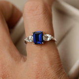 2ct Emerald Cut Blue Sapphire Pear Accents Trilogy Ring 14k White Gold Finish