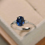 1ct Oval Blue Sapphire Engagement Ring Round Accents Trilogy 14k White Gold Over