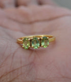 2.25ct Oval Cut Green Peridot Trilogy Engagement Ring 14k Yellow Gold Finish