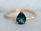 1.2ct Pear Cut London Blue Topaz Solitaire with Accent Ring 14k Rose Gold Finish