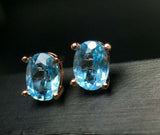 2.3ct Stud Earrings Oval Cut Blue Topaz Solitaire Design 14k Rose Gold Finish