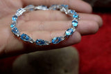 14ct Oval Cut Blue Topaz Diamond Petite Women Tennis Bracelet 14k WhiteGold Over