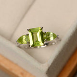 2ct Emerald Cut Green Peridot Pear Accents Trilogy Ring 14k White Gold Finish