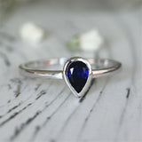 1Ct Pear Cut Sapphire Bezel Set Solitaire Engagement Ring 14K White Gold Finish