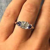 2.5Ct Round Cut Diamond Trilogy Ring 14K White Gold Finish Blue Sapphire Accents