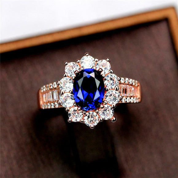 2ct Oval Cut Blue Sapphire Floral Halo Baguette Accent Ring 14k Rose Gold Finish