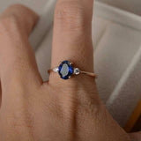 1ct Oval Blue Sapphire Engagement Ring Round Accents Trilogy 14k Rose Gold Over