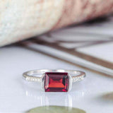 1.5ct Emerald Cut Red Garnet Accents with Solitaire Ring 14k White Gold Finish