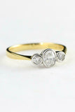 Round Accent Trilogy Engagement Ring 0.85ct Oval Cut Diamond 14k Two Tone Finish