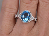 2.3ct Oval Cut Blue Topaz Engagement Ring Infinity Design 14k White Gold Finish