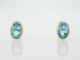 3.2ct Oval Cut Blue Topaz Bezel Set Solitaire Stud Earrings 14k Yellow Gold Over